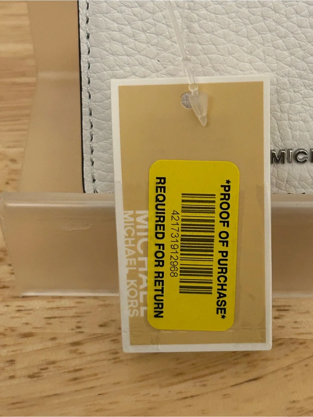 Michael Kors White Pebbled Leather Zip Card Case with MK Charm